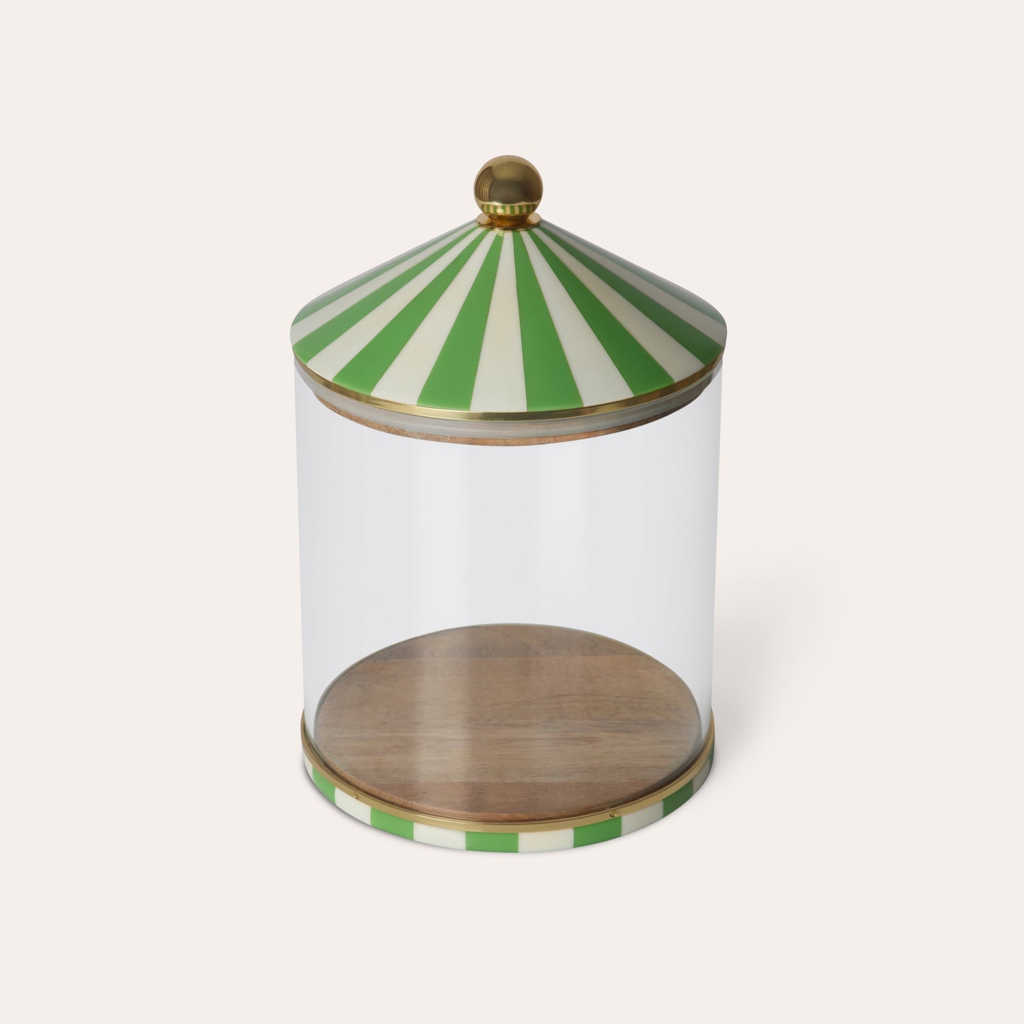 Clear glass jar with light green and white striped lid on a white background