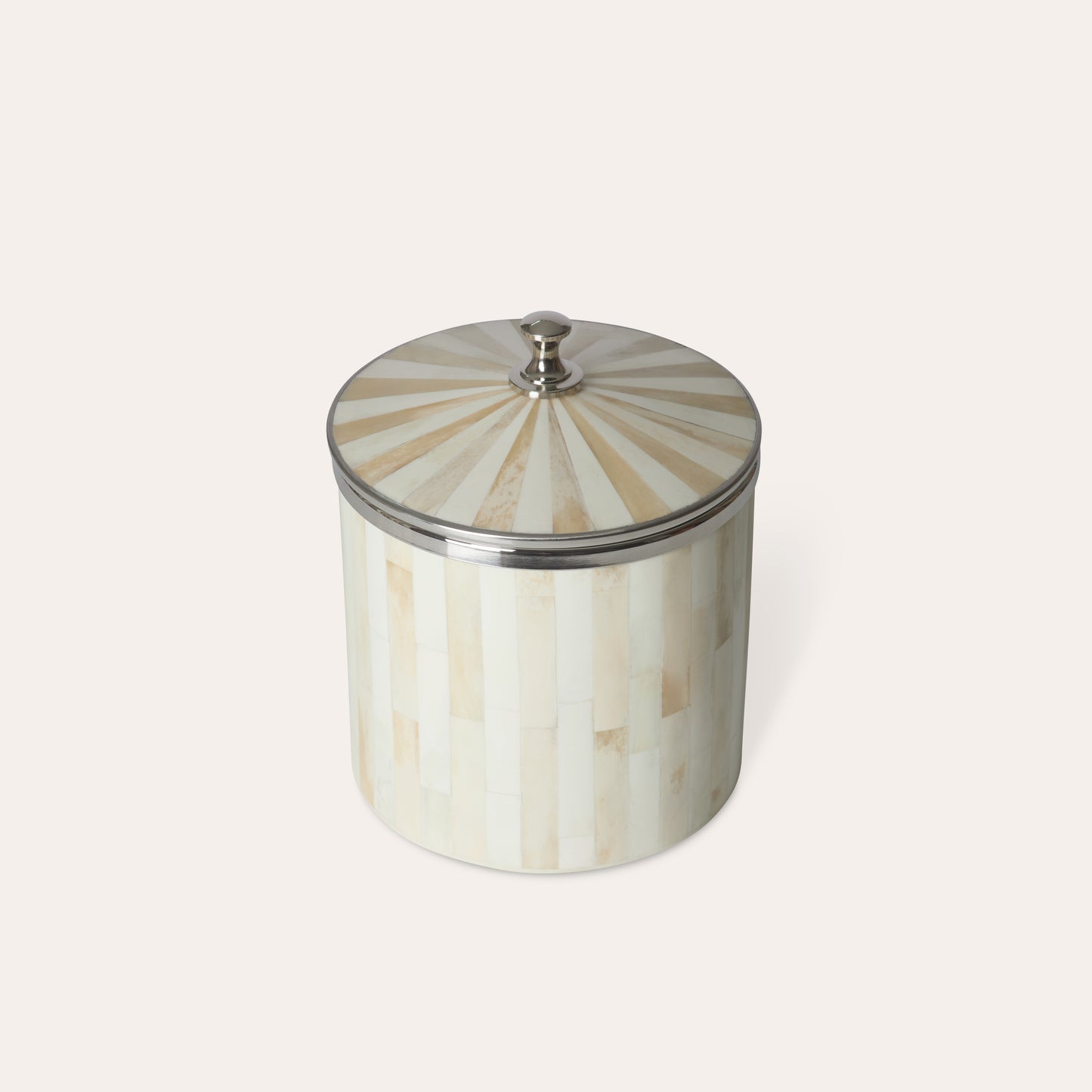Decorative ice bucket storage jar with  lid and silver chrome details in a beige shell stripe pattern on a white background.
