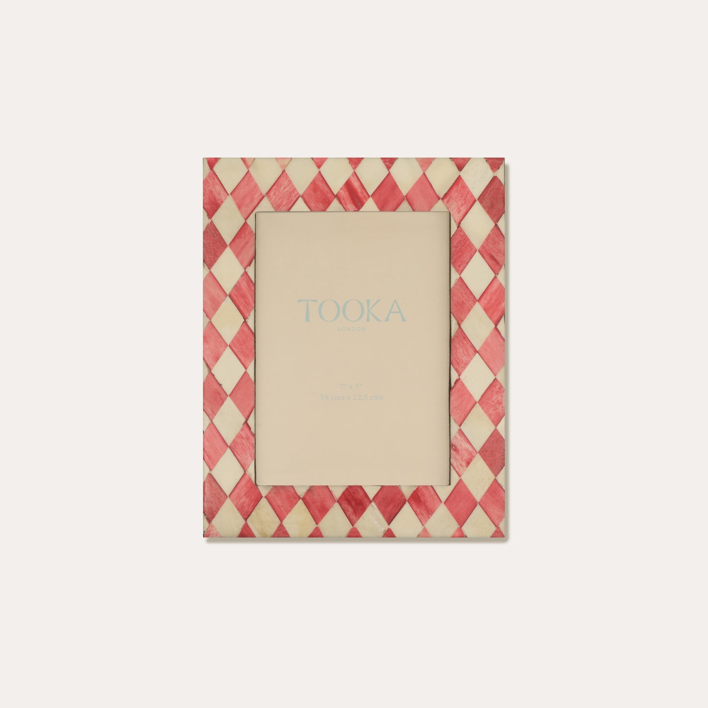 Decorative picture frame with a red and beige checkered pattern on a white background
