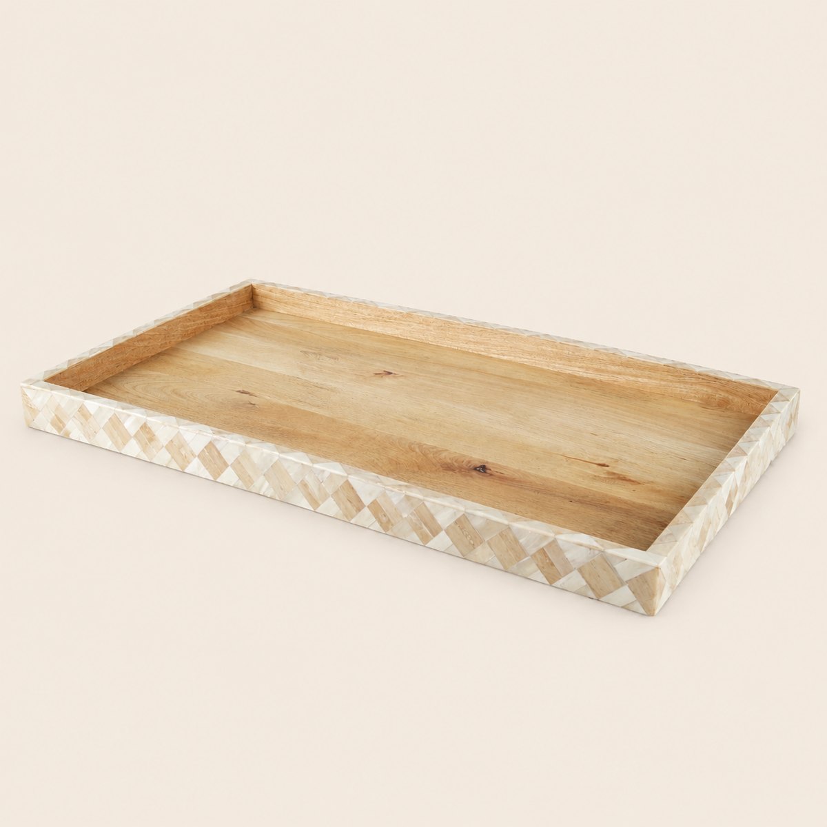 A rectangular wooden serving tray with a natural wood interior and a decorative border made of inlaid beige and cream geometric shapes, shown on a solid light beige background.