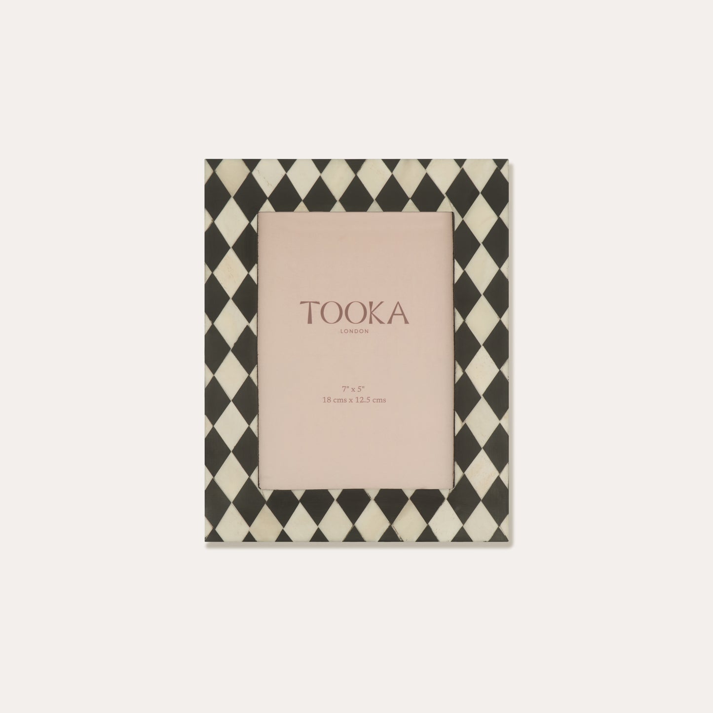 Checkered photo frame with 'Tooka' branding on a white background