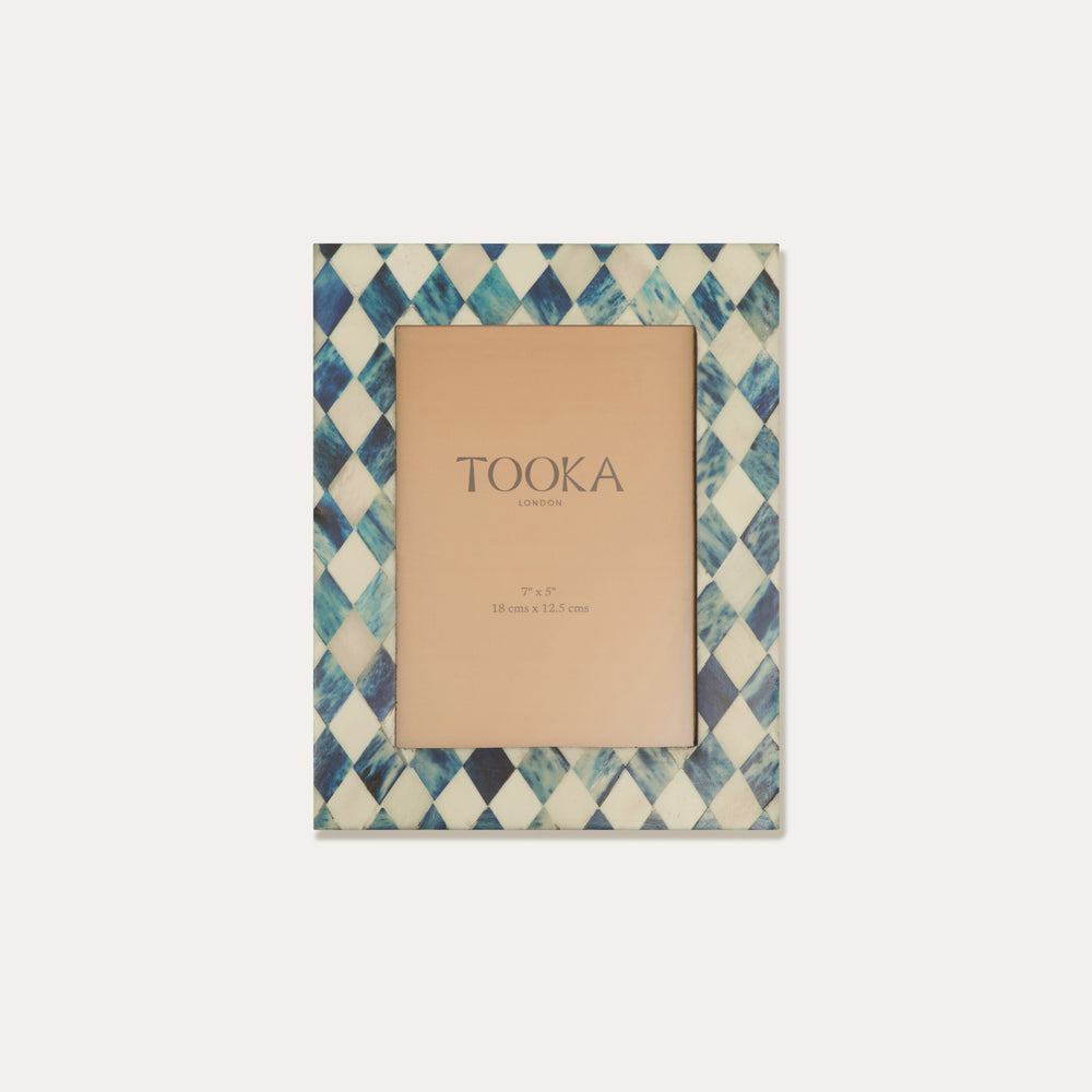 Patterned small picture frame with 'Tooka' branding on a white background