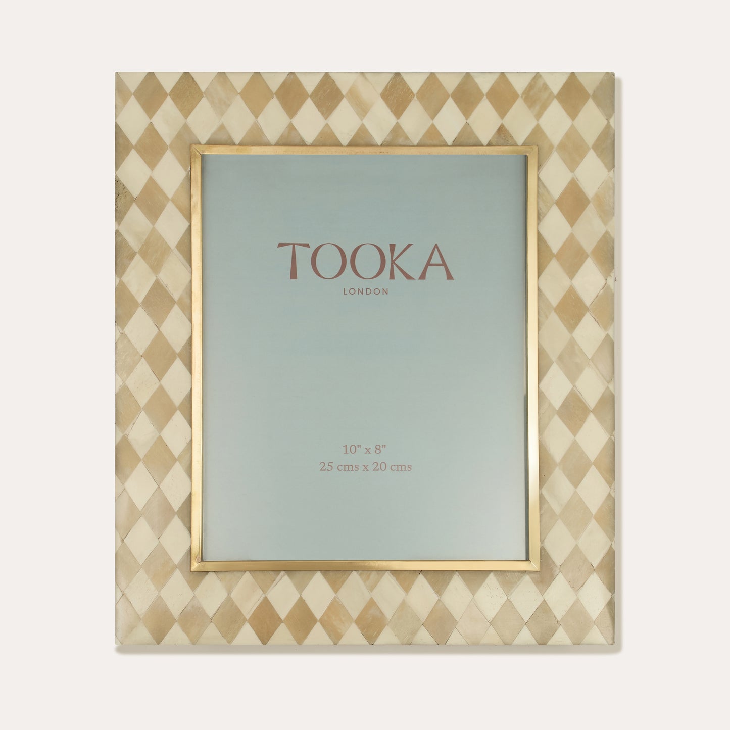 Decorative picture frame with diamond geometric pattern and 'Tooka' branding on a white background
